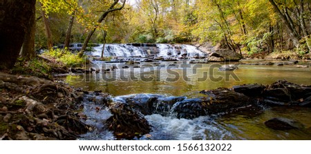 panorama of the waterfall and stream