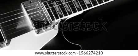  vintage electric guitar closeup . black and white                               