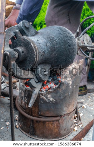 Old traditional charcoal pot for making pop corns