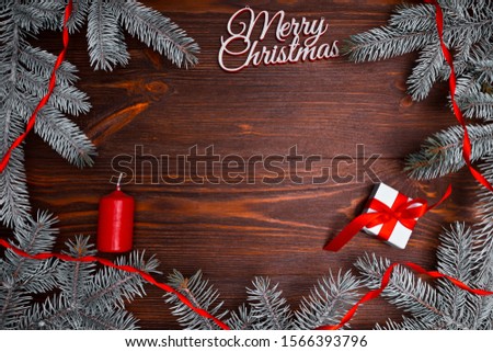 Handmade Christmas gift boxes on a brown table. background from above. Merry Christmas greeting card, frame. Winter holiday theme. Happy New Year.