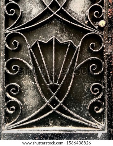 Traditional door pattern. Fragment of baroque metal gate. Door inspiration
