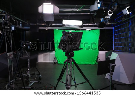 Modern video recording studio with professional cameras