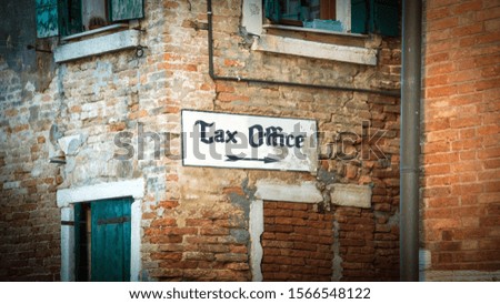 Street Sign the Direction Way to Tax Office
