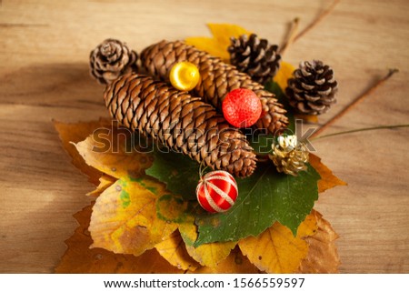 pine cone with ornaments stock photo