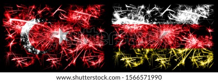 Turkey, Turkish vs South Ossetia New Year celebration sparkling fireworks flags concept background. Combination of two abstract states flags.
