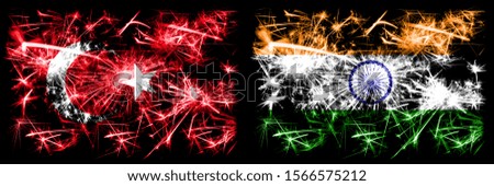 Turkey, Turkish vs India, Indian New Year celebration sparkling fireworks flags concept background. Combination of two abstract states flags.
