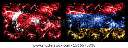 Turkey, Turkish vs Armenia, Armenian New Year celebration sparkling fireworks flags concept background. Combination of two abstract states flags.
