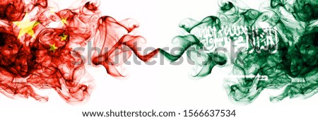 China, Chinese vs Saudi Arabia, Arabian smoky mystic states flags placed side by side. Concept and idea thick colored silky abstract smoke flags