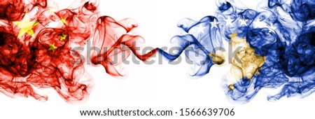 China, Chinese vs Kosovo, Serbia smoky mystic states flags placed side by side. Concept and idea thick colored silky abstract smoke flags