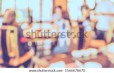 Vintage tone abstract blurred image Chinese restaurant with bokeh  for background usage.
