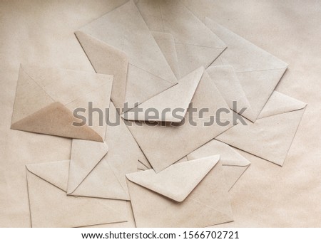 Kraft paper envelope on a kraft background. Perfect for invitations, card, message decorations