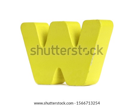 Yellow wooden alphabet letter w isolated on white background