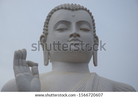 Close up of white Buddha statue in Mihintale , Sri Lanka