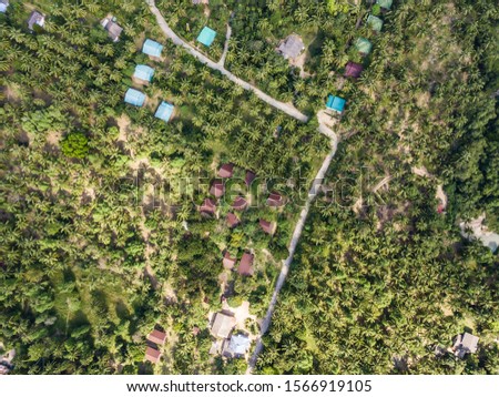 Aerial view on the roofs of houses on the island of Koh Phangan. Thailand