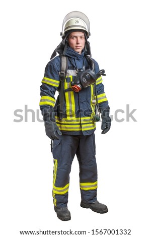 Young fireman with a mask and an air pack on his back in a fully protective suit on a white background Royalty-Free Stock Photo #1567001332