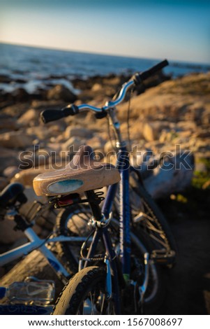Old bike park near the ocean in California at sunset. 