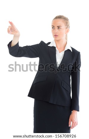 Beautiful blonde businesswoman showing with her hand on white background