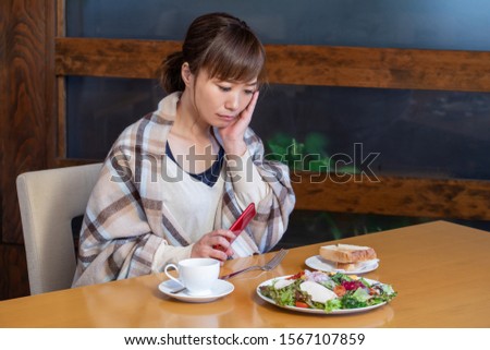 One woman who eats at a restaurant