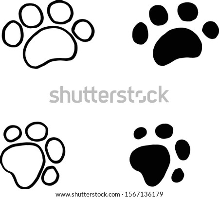 Dog footprints. White and black color.