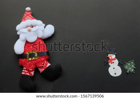 snow man and Santa Claus on black background decorations for Christmas new year concept