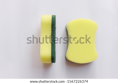 Sponge for dish washing on white background,Selective focus image.