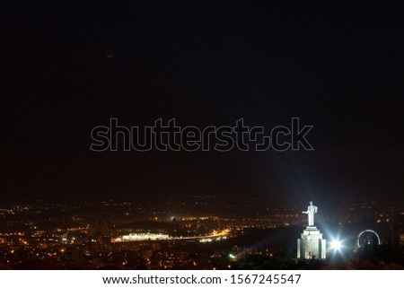 A beautiful aerial shot of the Mother Armenia Monument during a magical Yerevan night