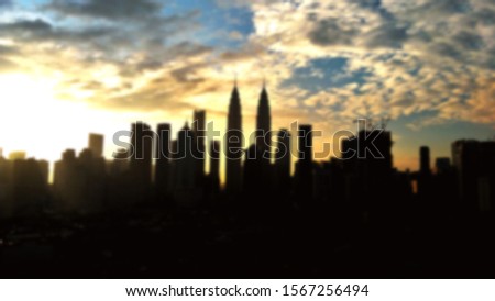 Blur image Kuala Lumpur skyline at dusk