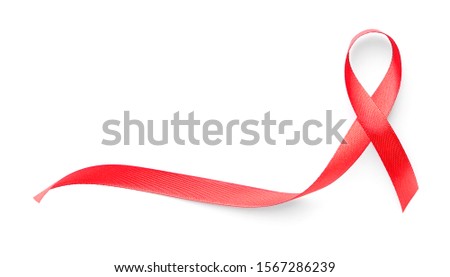 Red ribbon on white background. AID awareness concept Royalty-Free Stock Photo #1567286239