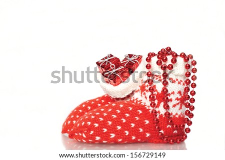 christmas stocking with gifts isolated on white background