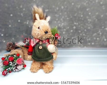 winter christmas background with squirrel decor garland lights                     