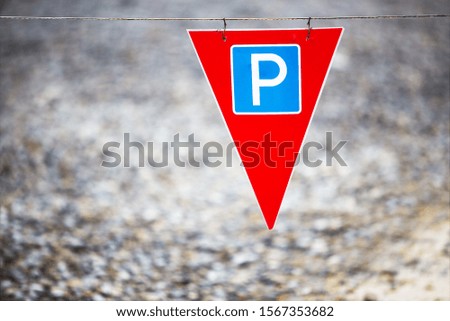 Road signs on the asphalt background. Parking.
