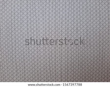 The surface of a plywood wall geometric pattern, a plywood wall background texture.