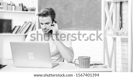 get information. back to school. Working day morning. student man in classroom with tea cup. college life. school teacher use laptop and smartphone. modern education. man make note and drink coffee.