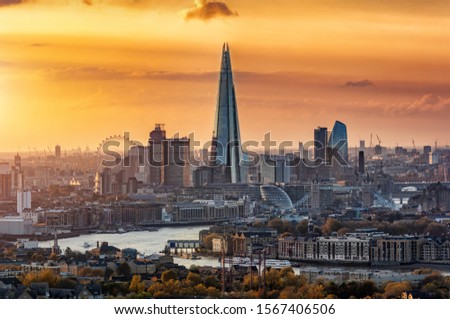 View to the modern skyline of London, United Kingdom, in autumn during sunset time with all the popular tourist attractions