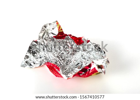 candy red wrapper empty and open isolated on white background with copy space for your text Royalty-Free Stock Photo #1567410577