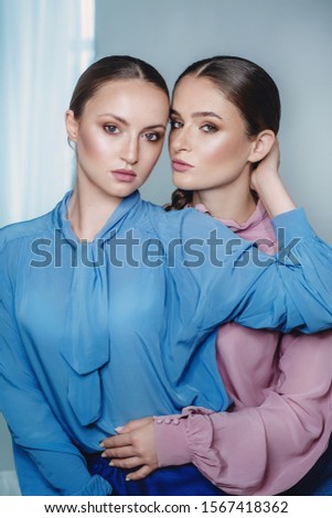 Beautiful portrait of two sisters 