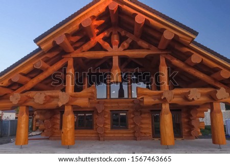 Details and elements of a wooden house made of timber. The construction of a wooden house.