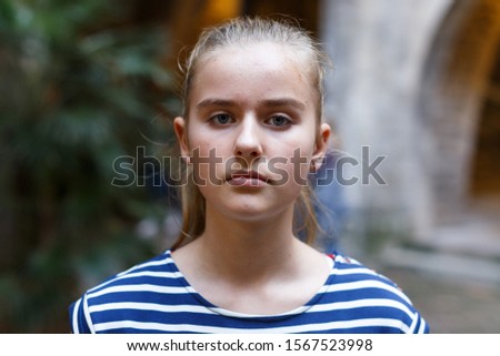 Portrait of teen girl standing near museum of  history arts  outdoor