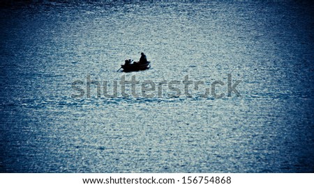 Boat silhouette in the water