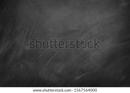 Abstract texture of chalk rubbed out on blackboard or chalkboard, concept for education, back to school, creativity, teaching , etc.