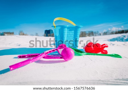 kids toys for making snowballs in winter nature, kids play outdoors