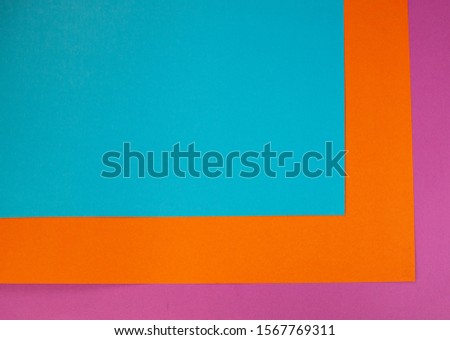 Fresh colored cardboard photo pink, orange and blue