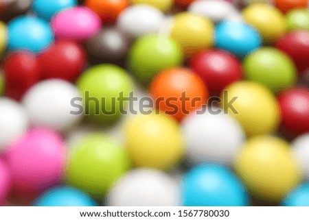 Close up of colorful chocolate coated candy blur