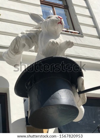 Rabbit jumping out of the hat on one of Vienna's beautiful buildings