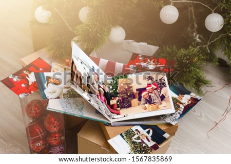 view open book with album christmas at home