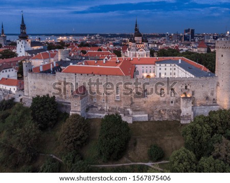 Aerial View of Old Town and Toompea castle at blue hour Tallin, Estonia.