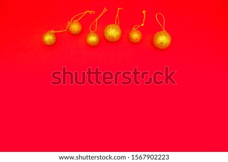 Red Christmas background with Christmas ornaments and festive decorations.Copy space. Place for design or text
