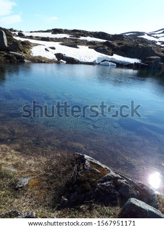 Picture of an icy water on the moutain in Western Norway.
