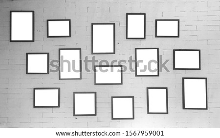 Collection of blank picture frame on the wall