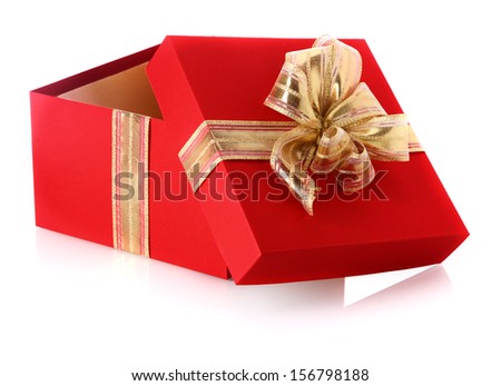 Festive red gift box with an open lid and golden bow for celebrating Christmas, Valentines, birthday or an anniversary on a reflective white surface
